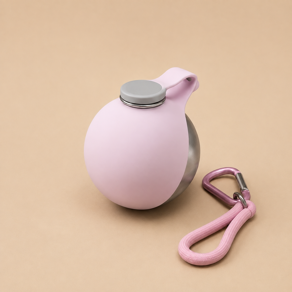 Caniora Portable Water Bottle, Pink, studio shot with carabiner clip